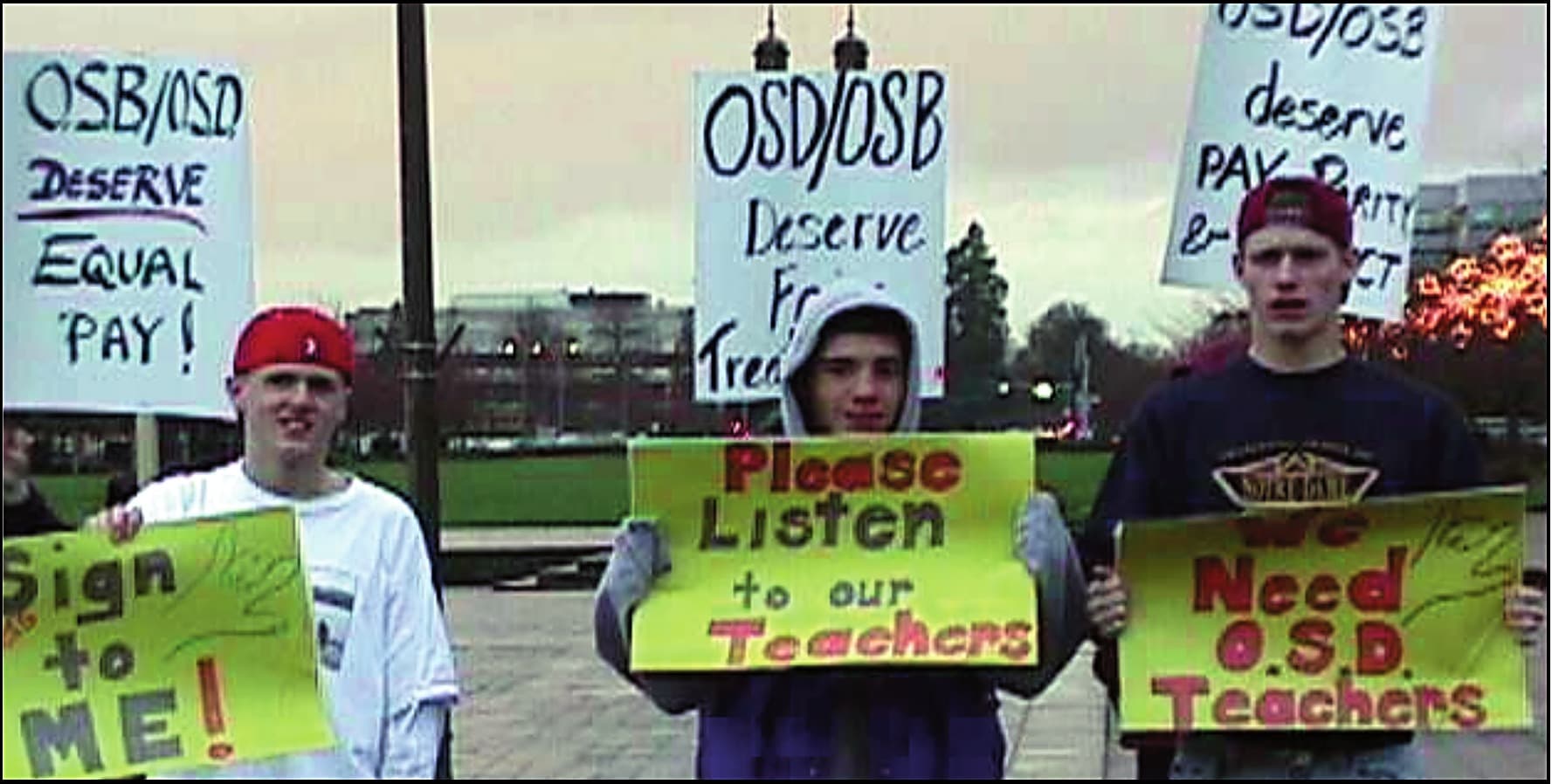 Supporters rally for teachers at the Oregon School for the Deaf.
