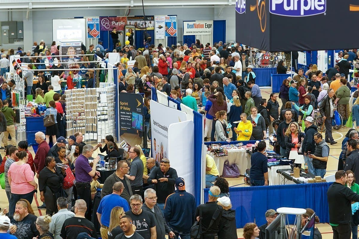 Exhibitors and visitors on the DeafNation Expo floor